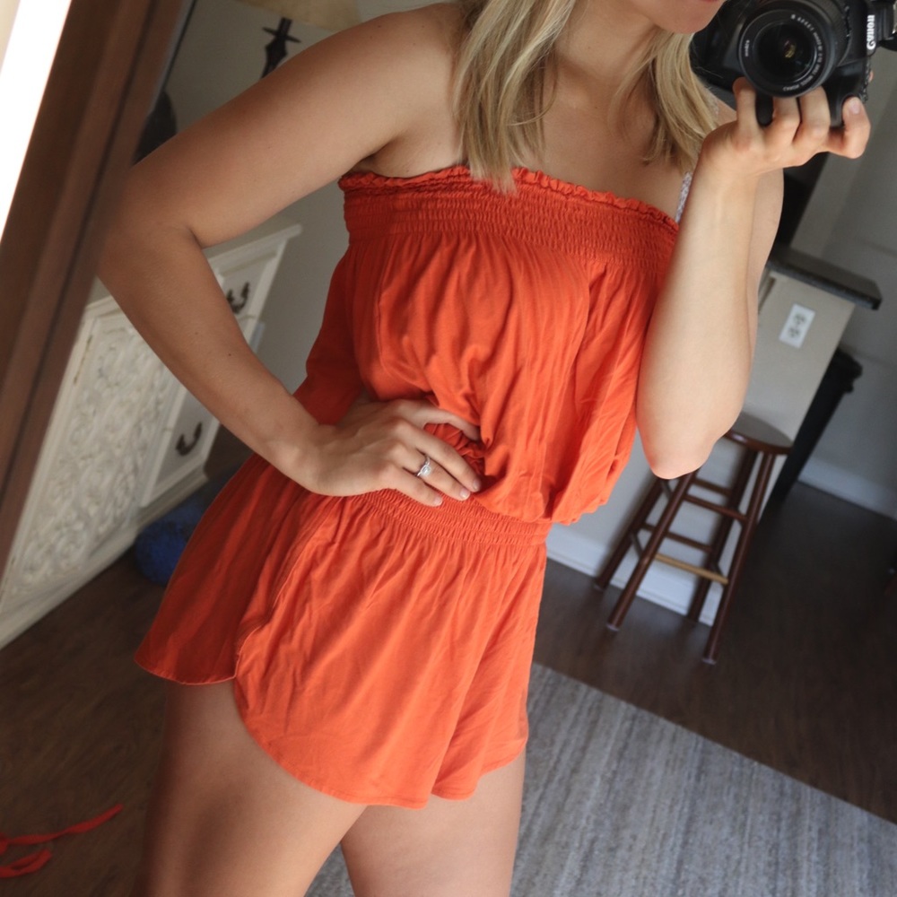 Orange romper.